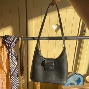 Urban Outfitters Black Shoulder Bag with silver hardware.